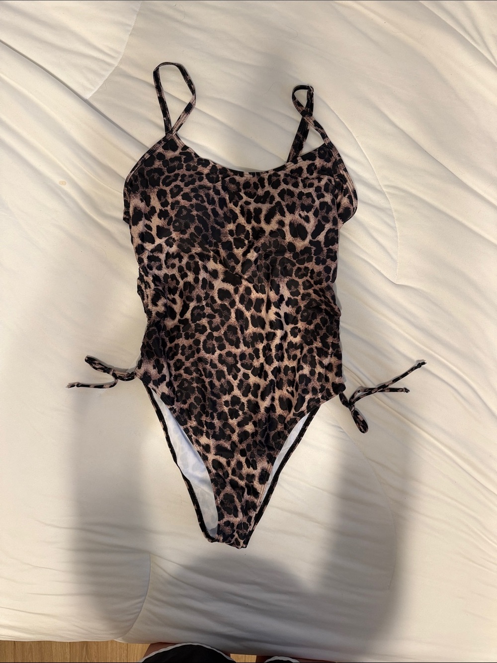 leopard one piece size Large. Never worn
